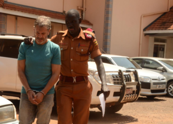 Carlos Alberto (L) at court.