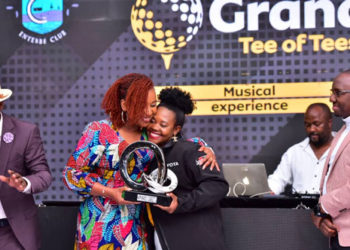 MTN CEO Sylvia Mulinge, hugs Bridget Basiima, winner of the Grand Tee of Tees and the overall winner in the Ladies Order of Merit