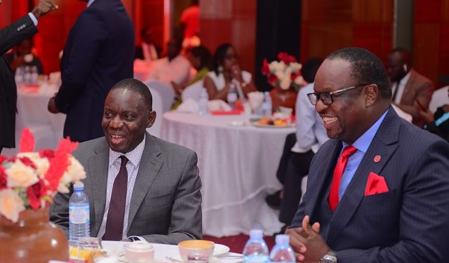 Dr. Michael Atingi-Ego and Mumba Kalifungwa have a precious time at the ABSA Economic Outlook and Africa Financial Markets Index 2023 Presentation.