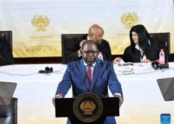 South African Finance Minister Enoch Godongwana (Front) delivers the 2024 Budget Speech in Cape Town, South Africa, on Feb. 21, 2024. South Africa’s economy is estimated to have grown by 0.6 percent last year and will increase to 1.6 percent over the next three years, Godongwana said here Wednesday. (Photo by Xabiso Mkhabela/Xinhua)