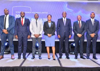 Stanbic Holdings Uganda Limited (SHUL) Senior Management Officers pose for a photo during Finacial results release event at Serena Hotel in Kampala.