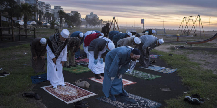 A group of Muslim praying in the month of Ramadan. Image may be subject to copyright.