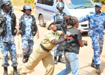 Ugandan Journalist attacked by the Police. Image may be subject to copyright