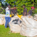 Workers at one of the waste collection and sorting sites