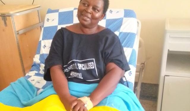 Dorothy Namukasa one of the beneficiaries her knee was replaced by an implant after surgery at Mulago hospital. PHOTO URN