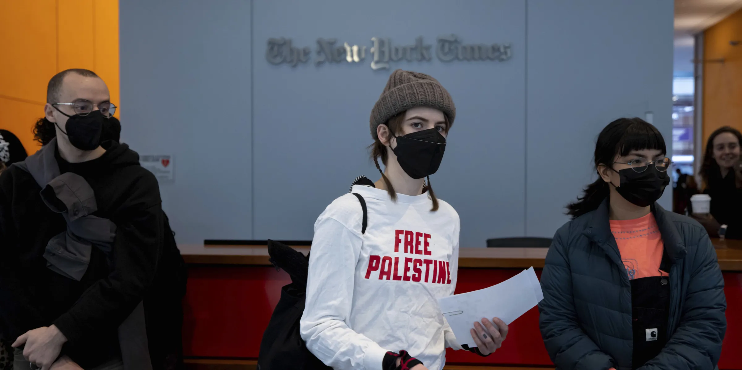 Pro-Palestine protesters flood the lobby of the New York Times offices and block the security entrances during a demonstration against the newspaper’s coverage of Israel's war on Gaza on March 14, 2024, in New York City. Photo: Michael Nigro/Sipa via AP Images