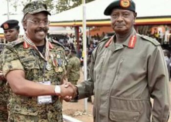 Gen. Kyanda with Museveni - Image may be subject to copyright