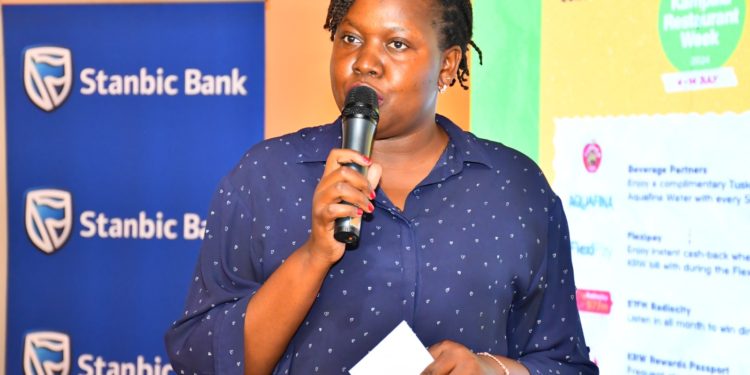 Jackie Abwol, the FlexiPay Head of Marketing at Stanbic Bank during the media launch