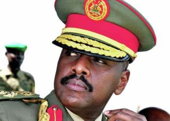 Muhoozi, cushioned in his role as Chief of Defense Forces, basks in the protection of his father’s military clout, fully aware that his father’s shadow overshadows the army.  Image maybe subject to copyright.