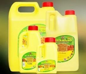 Ugandans, wake up! You’re not buying cooking oil; you’re buying a weapon, a bottle filled with corporate cruelty that cares nothing for you or your family. Image maybe subject to copyright.