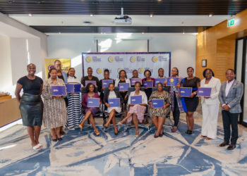 Graduates of the 2nd Cohort of the LEAN Forward Modular Program pose with CEO Summit Uganda officials at the program's graduation ceremony at Four Points by Sheraton Hotel.