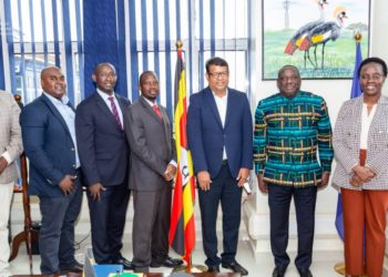 Airtel Uganda’s Managing Director, Mr. Soumendra Sahu(3rd  R), Uganda Communications Commission (UCC) Executive Director, Hon. Goerge William Nyombi Tembo(2nd R), Public Relations Manager Airtel Uganda, David Birungi(3rd L) posing for a photo at a courtesy visit by Airtel Uganda MD to UCC ED where Mr. Soumendra Sahu committed to the growth of Internet Access in Uganda.