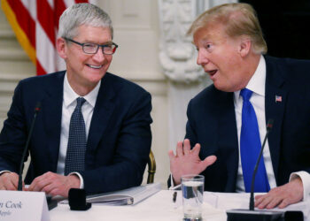 Apple CEO Tim Cook laughs with President Donald Trump during a meeting in the White House, Washington, March 6, 2019.
Leah Millis | Reuters
