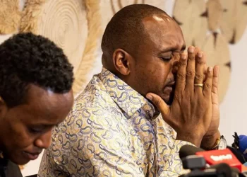 Boniface Mwangi (R) and Agather Atuhaire have given a harrowing account of their detention in Tanzania