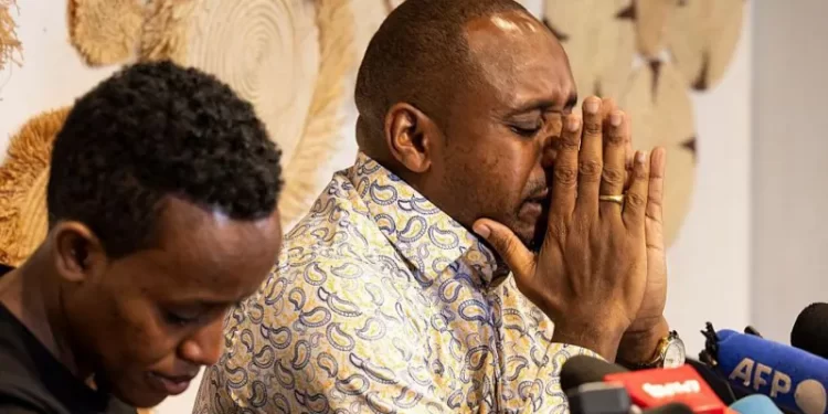 Boniface Mwangi (R) and Agather Atuhaire have given a harrowing account of their detention in Tanzania